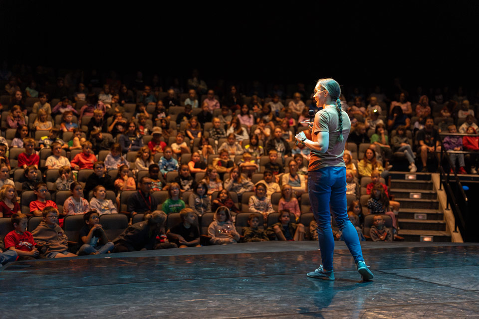 push/FOLD's Holly Shaw presenting 'Physics in Motion' at University of Idaho's Hartung Theatre to elementary students in Moscow, ID.