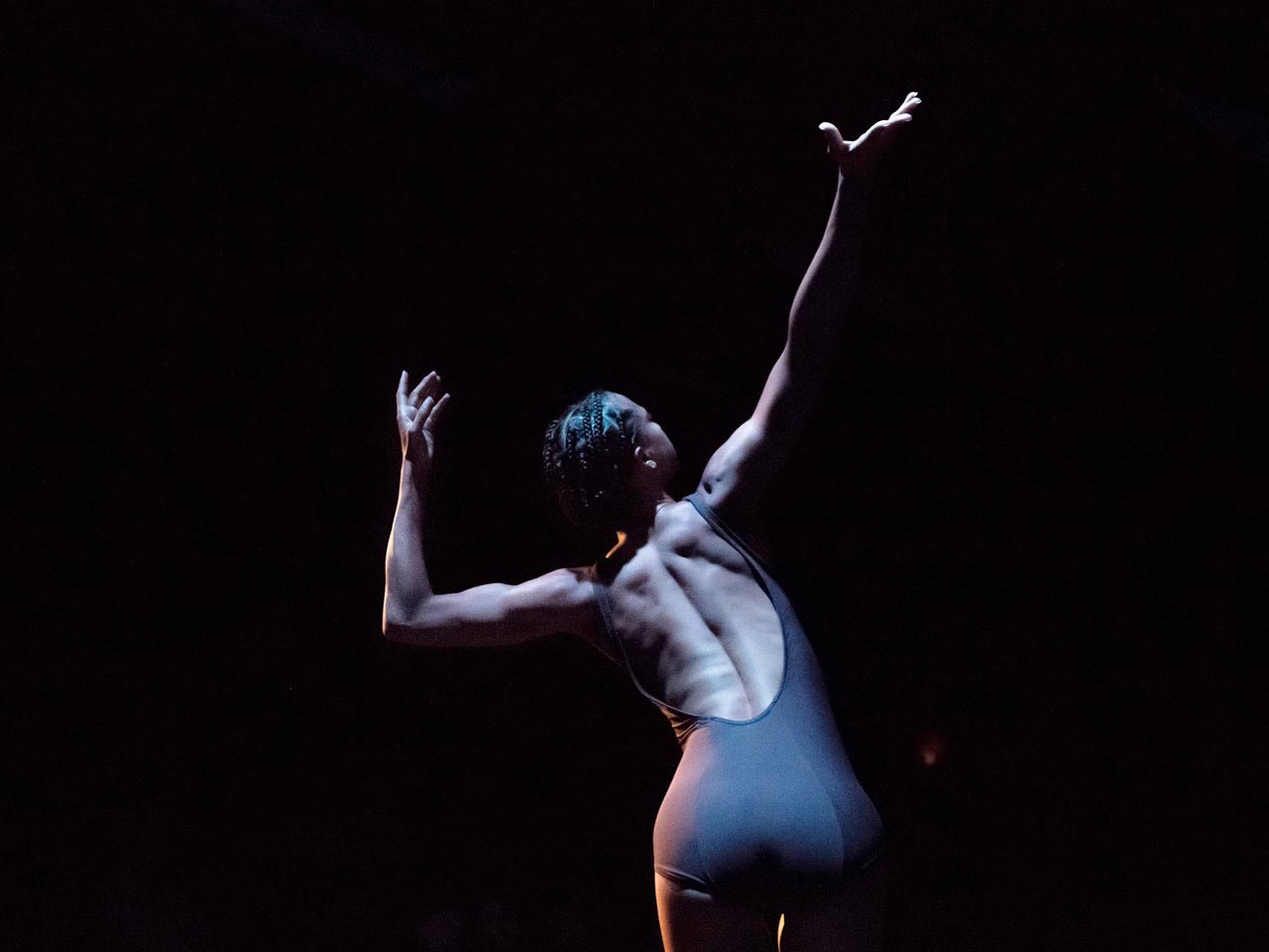 push/FOLD dancer Ashley Morton performs her solo in Samuel Hobbs' work 'Ash' at Union PDX - Festival:19 at the Hampton Opera Center in Portland, Oregon | Photography: Jingzi Zhao