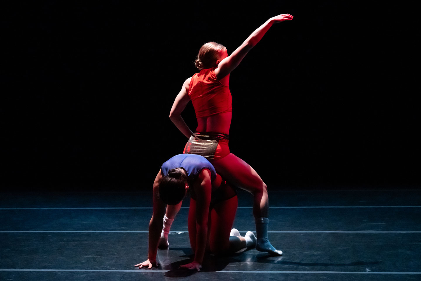 Union PDX - Festival:23 company Open Space dancers perform Franco Nieto's work 'Confetti Head'. Photo depicts two dancers, one sitting atop another. | Photography: Jingzi Zhao