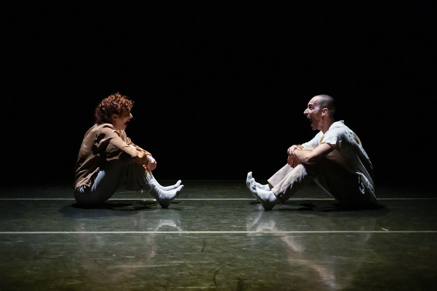 Union PDX - Festival:23 company Outrun the Bear, Megan Doheny and Ily Nikurov perform their work work 'Once and for All'. Photo depicts Megan and Ilya seated, screaming towards each other. | Photography: Jingzi Zhao